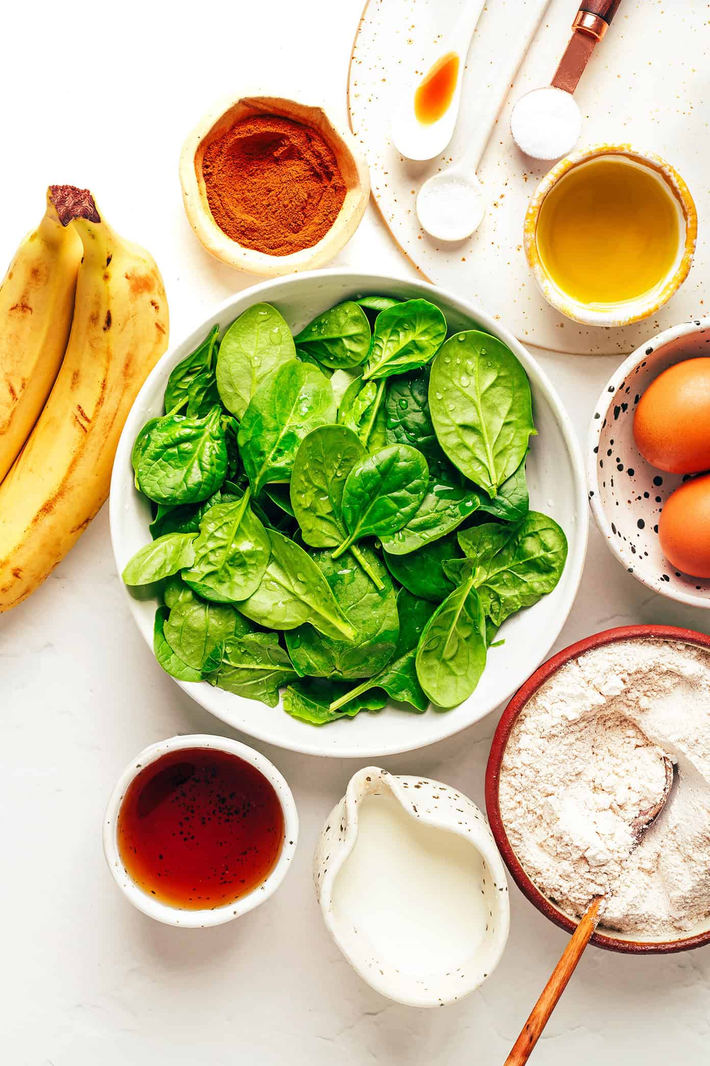 These blender spinach banana muffins are kid-approved, naturally sweetened and gluten-free, and so delicious! | gimmesomeoven.com green muffin ingredients