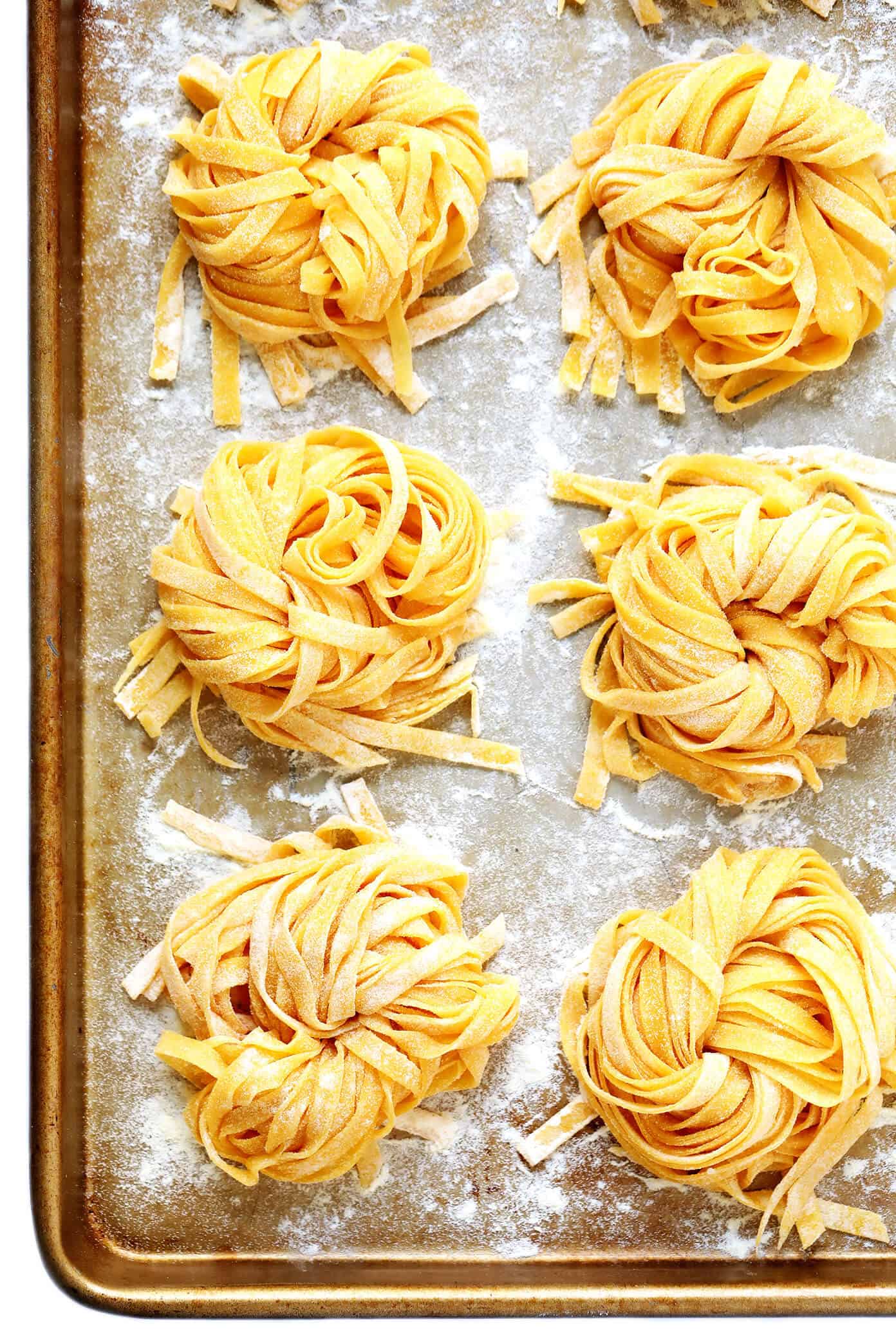 This 4-ingredient homemade pasta recipe is the best! Learn how to make pasta by hand, in the stand mixer, or with a food processor. Plus tips on which flours to use and how to use a pasta maker if you'd like. | gimmesomeoven.com #pasta #italian #homemade #howto #dinner #spaghetti #tutorial Homemade Pasta