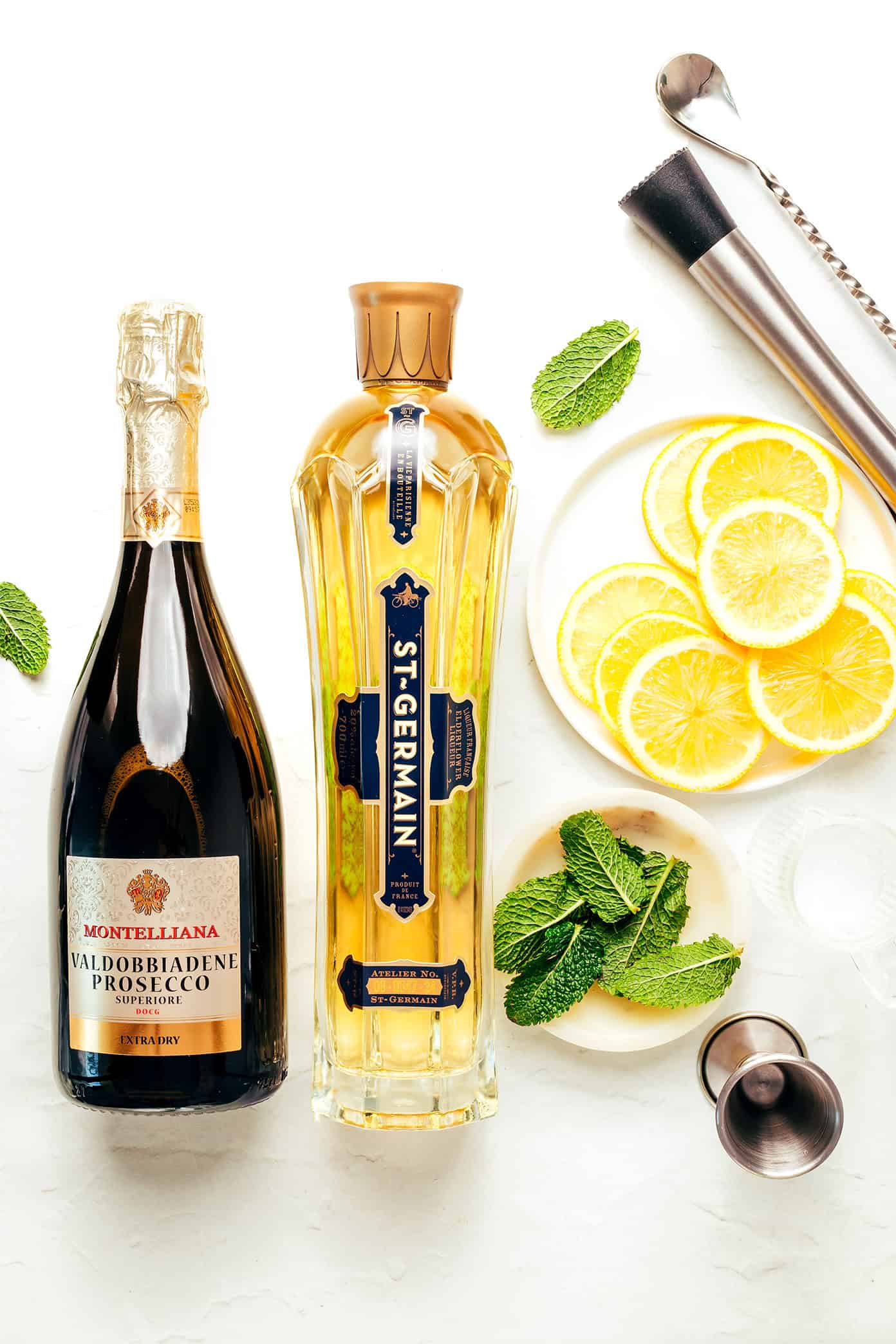 This classic Hugo Spritz recipe is made with prosecco, elderflower liqueur, soda water, mint, and lime โ the perfect Italian cocktail for summer. | gimmesomeovencom Hugo Spritz Ingredients