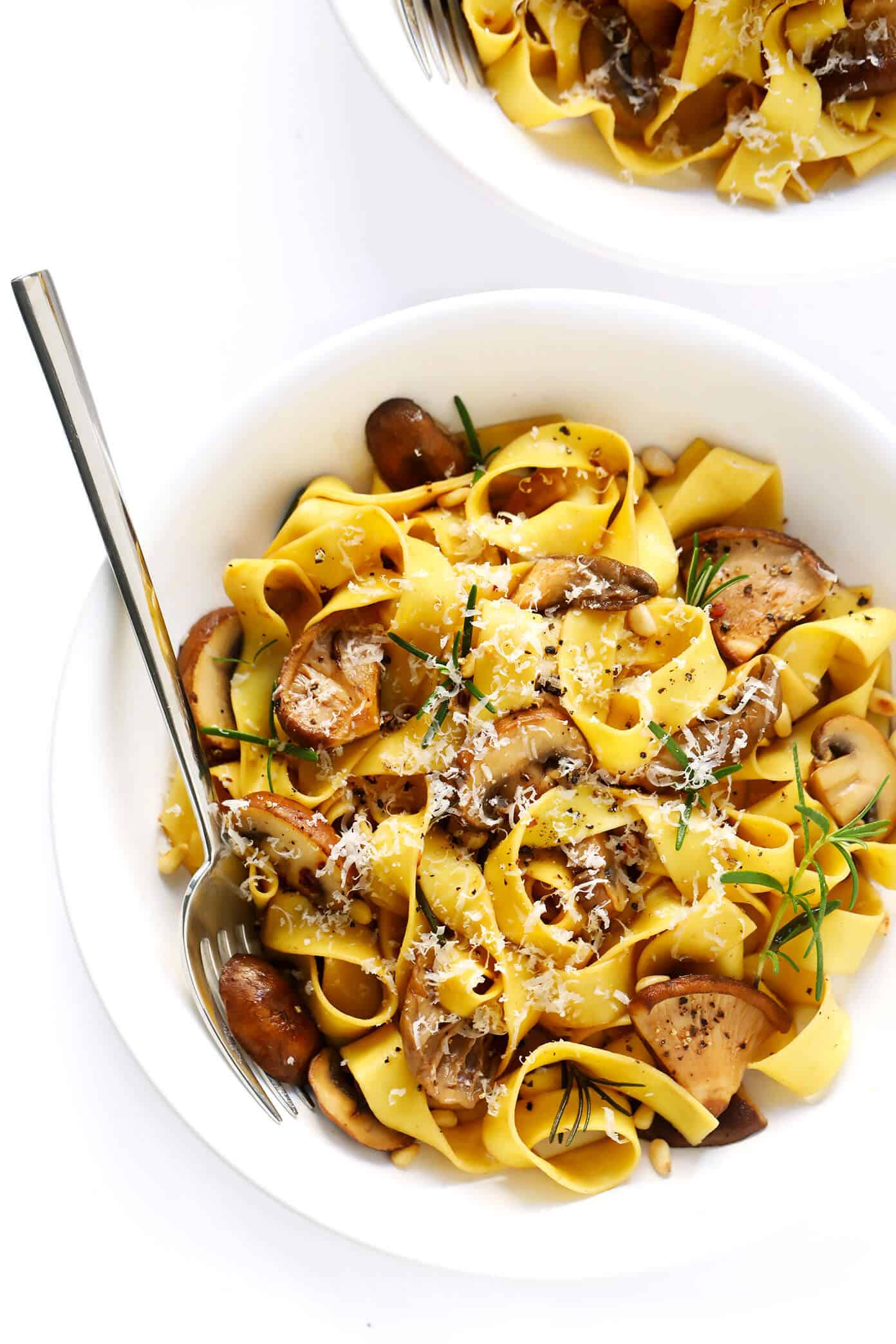 This Mushroom Lovers Pasta recipe is tossed with a heavenly rosemary balsamic butter sauce, lots of Parmesan cheese, pine nuts, and whatever kinds of mushrooms you love. Total (vegetarian!) comfort food. | gimmesomeoven.com #pasta #mushroom #vegetarian #dinner #valentines #cheese #sauce #italian Mushroom Lovers Pasta