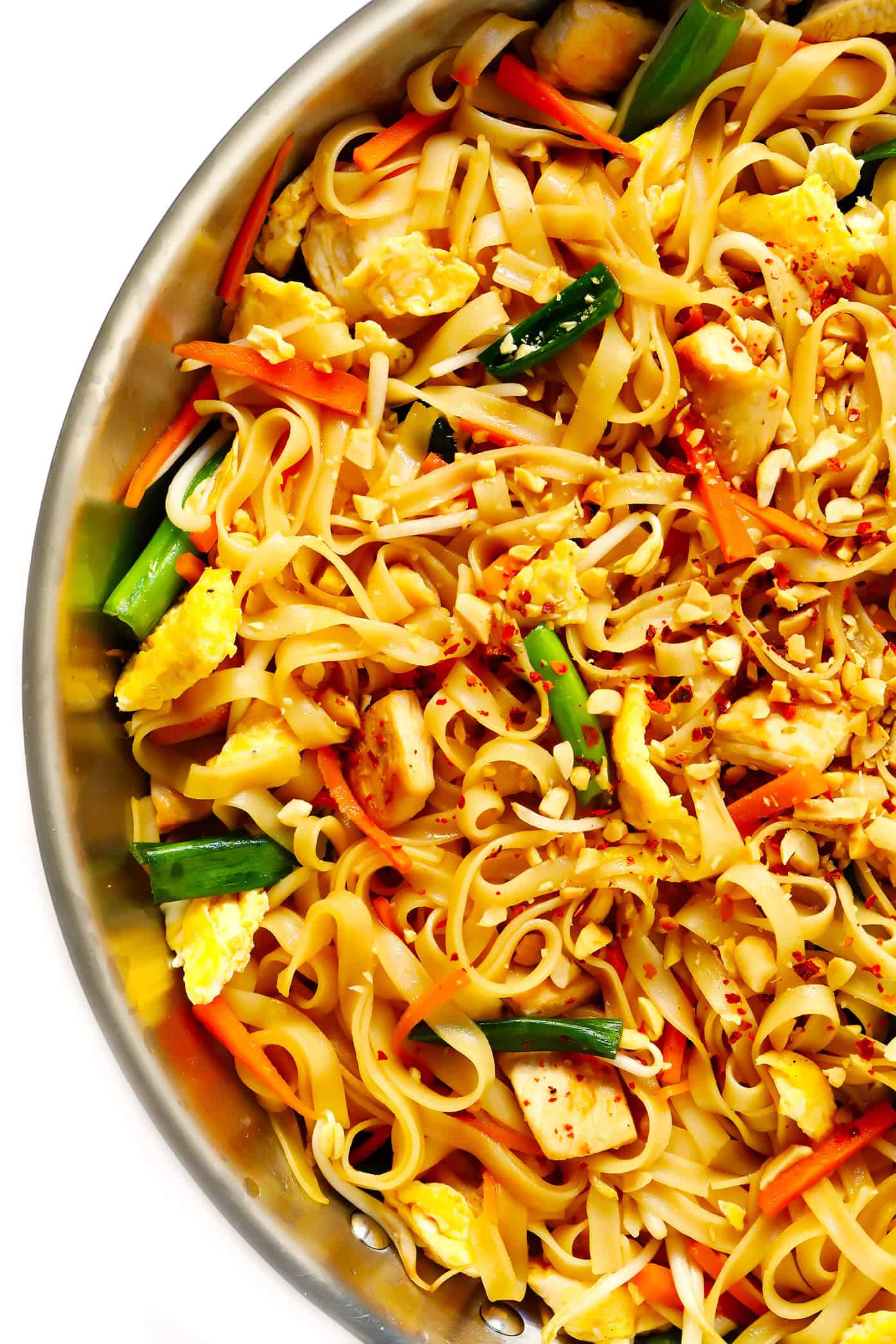 The BEST Pad Thai recipe! It's easy to make with either chicken, beef, pork, shrimp or vegetarian (with or without tofu), and tastes even better than the restaurant version! A delicious healthy dinner recipe that everyone will love. | gimmesomeoven.com #padthai #thai #noodles #stirfry #takeout #chicken #healthy #dinner #recipe #vegetarian Pad Thai Recipe