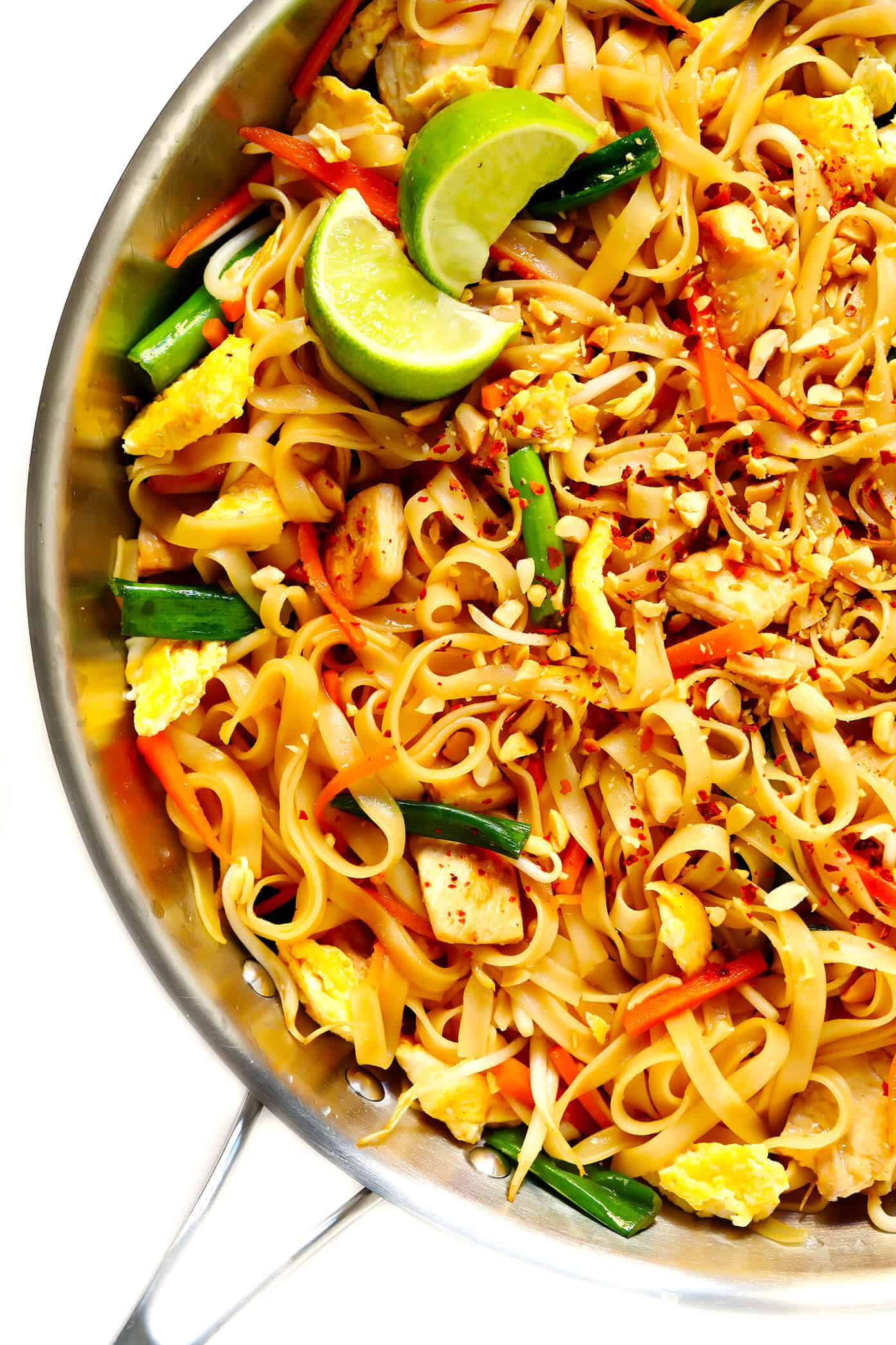 The BEST Pad Thai recipe! It's easy to make with either chicken, beef, pork, shrimp or vegetarian (with or without tofu), and tastes even better than the restaurant version! A delicious healthy dinner recipe that everyone will love. | gimmesomeoven.com #padthai #thai #noodles #stirfry #takeout #chicken #healthy #dinner #recipe #vegetarian Pad Thai Recipe