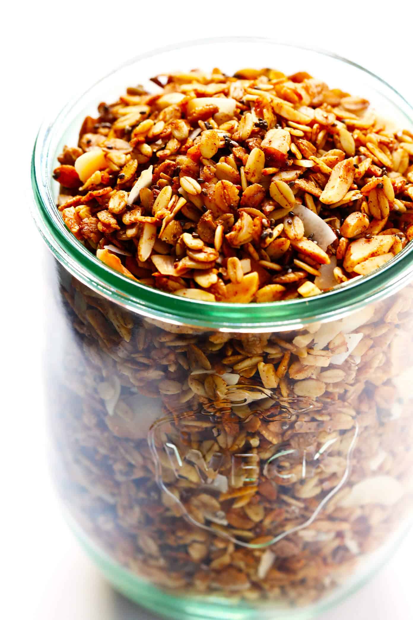 The BEST Healthy Granola recipe! It's quick and easy to make, naturally sweetened with honey or maple syrup, and it can be customized with whatever add-ins you love best. Perfect for an easy breakfast or snack. | gimmesomeoven.com #granola #healthy #breakfast #snack #glutenfree #vegan The BEST Healthy Granola Recipe